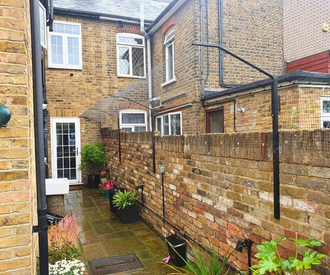 Cat Fence Barrier On Low Wall