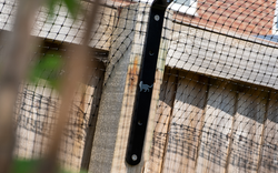 Cat Fence Bracket with ProtectaPet Silver Logo